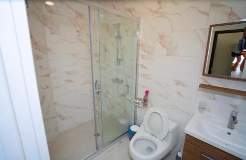 Koupelna v ubytování Hotel Leonardo