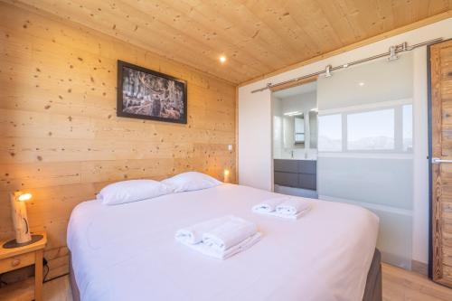 Postel nebo postele na pokoji v ubytování Alpe d'Huez Houses - Chez Val - Magnifique 62m2 pour 6 avec vue montagne splendide - Les Chances