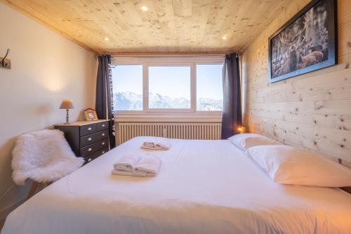 Postel nebo postele na pokoji v ubytování Alpe d'Huez Houses - Chez Val - Magnifique 62m2 pour 6 avec vue montagne splendide - Les Chances