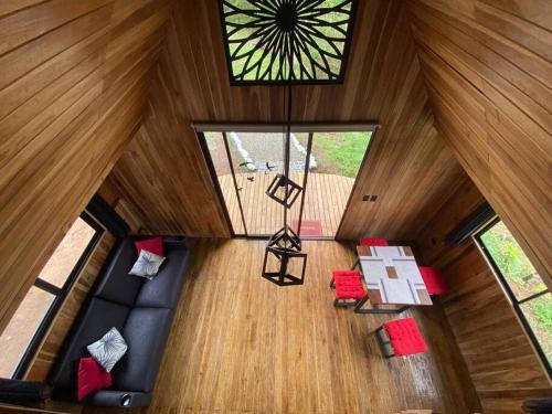 an overhead view of a living room in a house at Myra Chalets in Bijagua