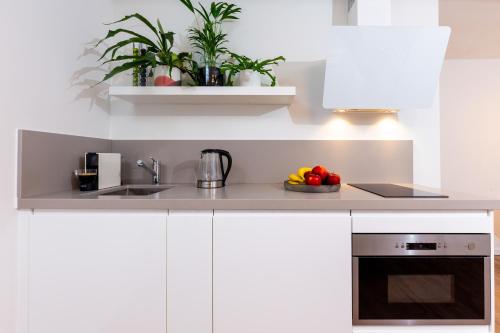 Kuchyň nebo kuchyňský kout v ubytování Designer Loft Apartment in Delft city new 38B