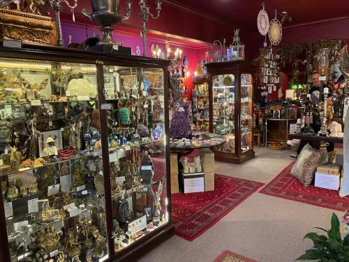 a store filled with lots of differentiatesiatesiatesiatesiatesiatesiatesiatesiates at Sassafras Treehouse Private home in the Dandenong Ranges, Victoria in Sassafras
