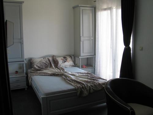 Postel nebo postele na pokoji v ubytování Guest House Dena