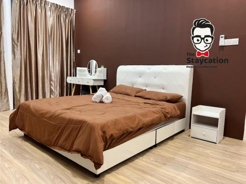 Postel nebo postele na pokoji v ubytování Staycation Homestay 26 P Residence near bt kawa