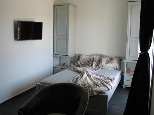 Postel nebo postele na pokoji v ubytování Guest House Dena