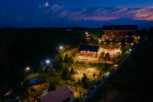 an aerial view of a building at night at SEN VILLA Boutique in Bao Loc