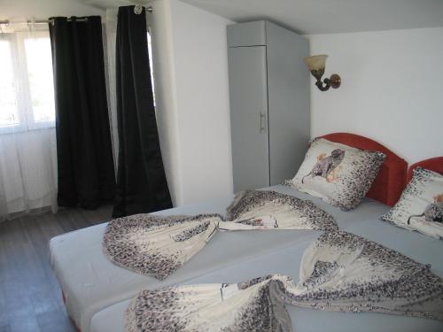 Postel nebo postele na pokoji v ubytování Guest House Dena