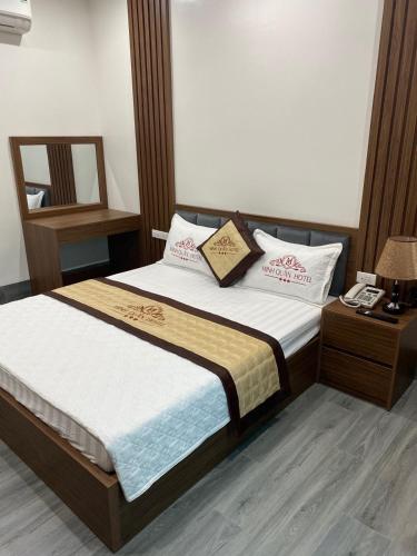 Krevet ili kreveti u jedinici u okviru objekta Minh Quân Hotel - Ngõ 5 Do Nha - by Bay Luxury