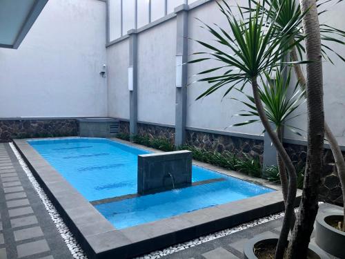Πισίνα στο ή κοντά στο Kana Citra Guesthouse
