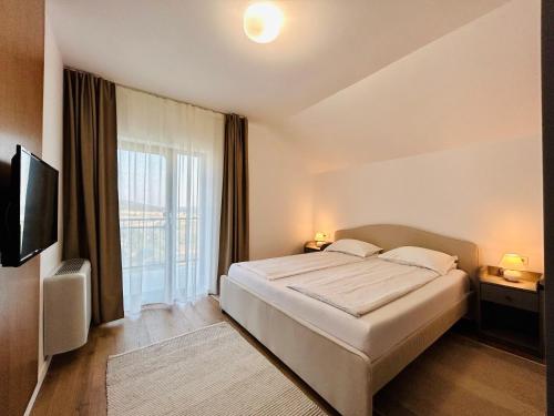 Postel nebo postele na pokoji v ubytování Hermes Guest House