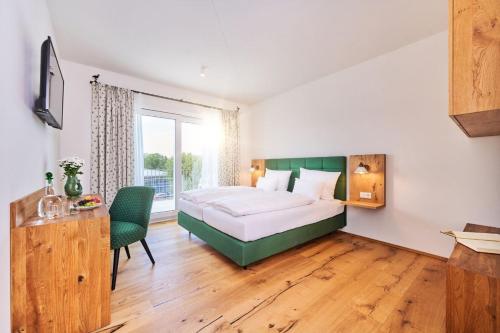 Ένα ή περισσότερα κρεβάτια σε δωμάτιο στο Hotel Der Einrichter