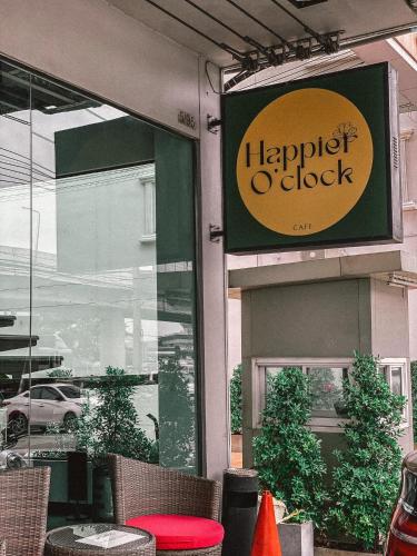 a sign on the side of a restaurant at Campagne Hotel and Residence - SHA Plus in Pathum Thani