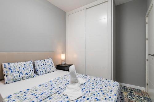 Postel nebo postele na pokoji v ubytování Cerca Santiago Bernabéu - Apartamento TORRE PICASSO