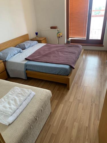 Postel nebo postele na pokoji v ubytování Apartament in the center of Poprad-free parking