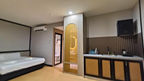 Кровать или кровати в номере Urban Inn, SP Saujana