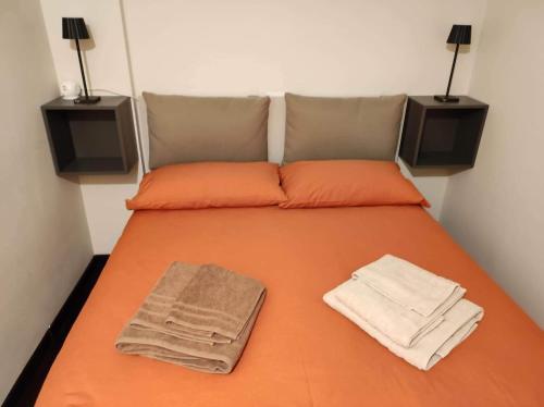 Giường trong phòng chung tại Il Rifugio