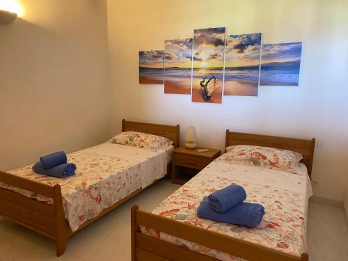 Katil atau katil-katil dalam bilik di Résidence Playa Del'Oro