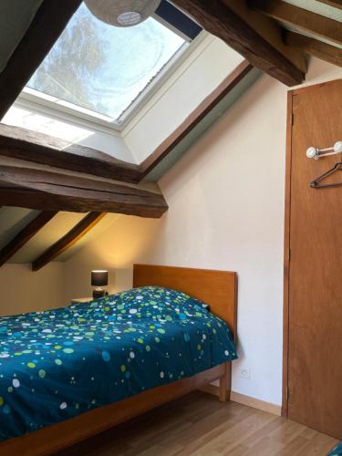 Postel nebo postele na pokoji v ubytování Gîte les érables