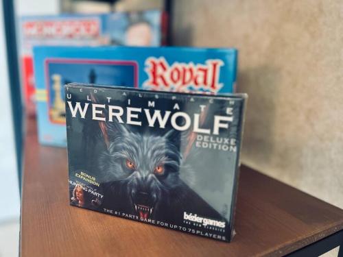 a box of a werewolf dvd sitting on a table at Teega 8 pax Luxury Family suite by Our Stay in Nusajaya