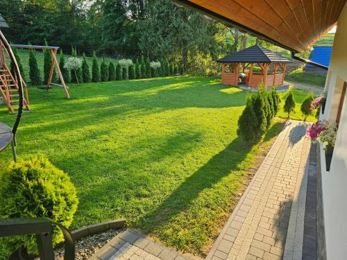 Κήπος έξω από το Apartamenty w cichej okolicy