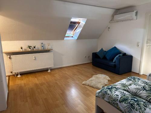 Et sittehjørne på A&V Apartments Gemütliche Rheinblick Wohnung