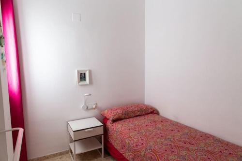 Postel nebo postele na pokoji v ubytování Libertad by Gades Gestión