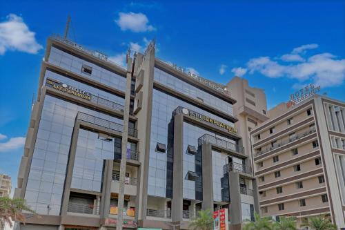 a rendering of a building in a city at HOTEL LEE PLATINUM in Ahmedabad