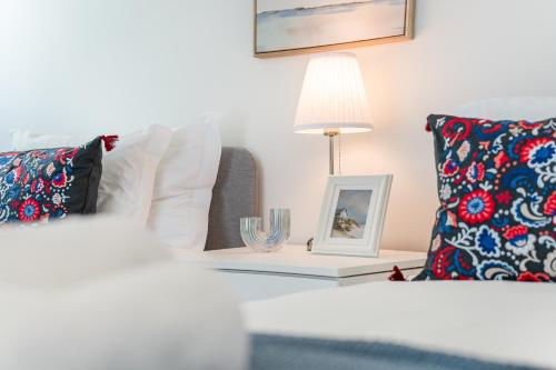 Un ou plusieurs lits dans un hébergement de l'établissement Elegant Belém Hideaway