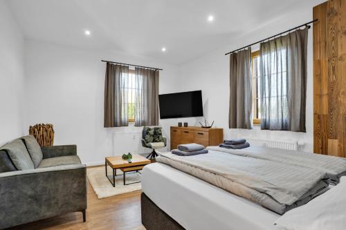 Postel nebo postele na pokoji v ubytování Apartmány Ochsendorf - Pod Strání