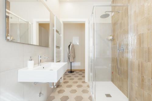 a bathroom with a sink and a shower at Palazzo Fritz in Badia Calavena