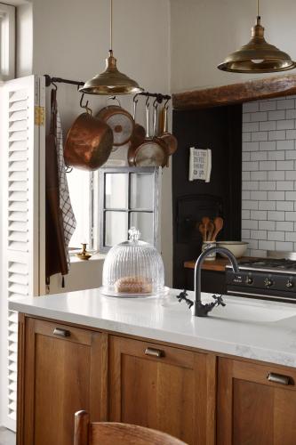 a kitchen with a sink and a counter top at Mukti in Nieu-Bethesda