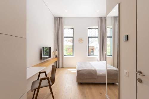 Una cama o camas en una habitación de Sophia Hotel Kyiv