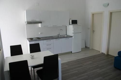Kuchyň nebo kuchyňský kout v ubytování Apartments Ruzic