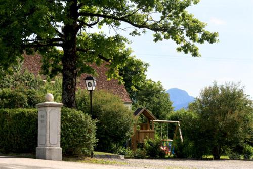 a street light in front of a house at Hotel Friedenseiche in Benediktbeuern