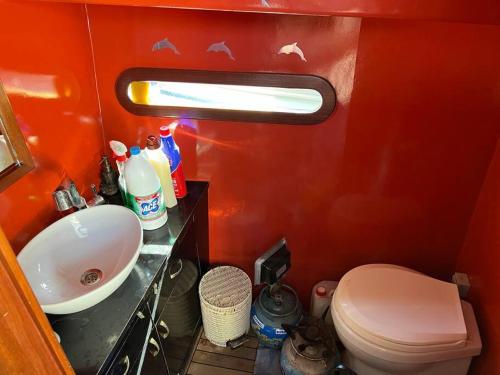 a small bathroom with a sink and a toilet at At Yeşilköy harbour pretty Lobste Only Accommodation in Istanbul