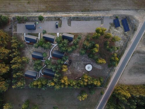 an aerial view of a park with trees and a road at Gorzewo Pora Relaksu in Gorzewo