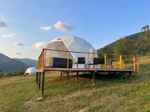 a yurt in the middle of a field at Tranquil Dome - Manta's Retreat Glamping Cornereva in Cornereva