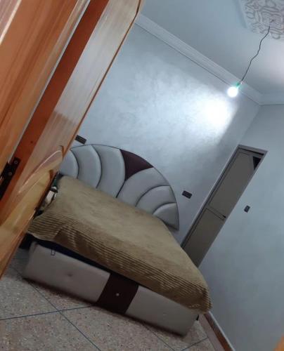Tempat tidur dalam kamar di Villa agadir