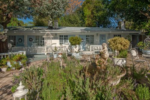 a house with a garden in front of it at The Lady Grace in Greyton