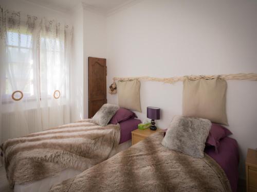Llit o llits en una habitació de Le Relais De Dalibray