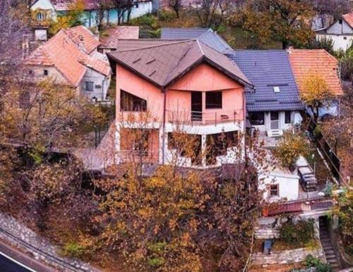 an aerial view of a house on a hill at Tampa Holiday Vila in Braşov
