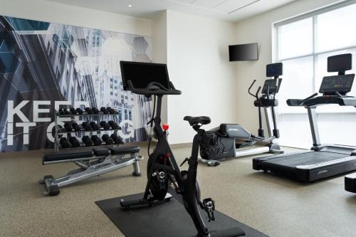 a gym with exercise bikes and a treadmill at SpringHill Suites by Marriott Pittsburgh Mt. Lebanon in Mount Lebanon