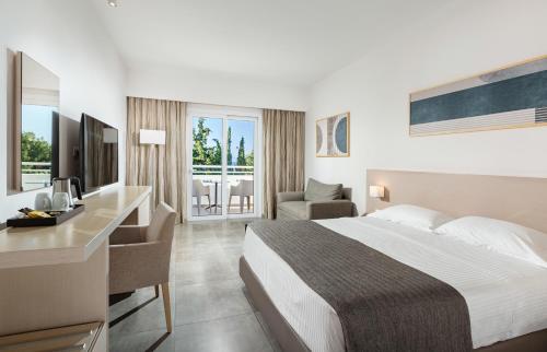 Postel nebo postele na pokoji v ubytování Platanista Hotel