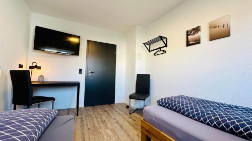 Ένα ή περισσότερα κρεβάτια σε δωμάτιο στο B&W Apartments
