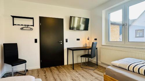 Ένα ή περισσότερα κρεβάτια σε δωμάτιο στο B&W Apartments