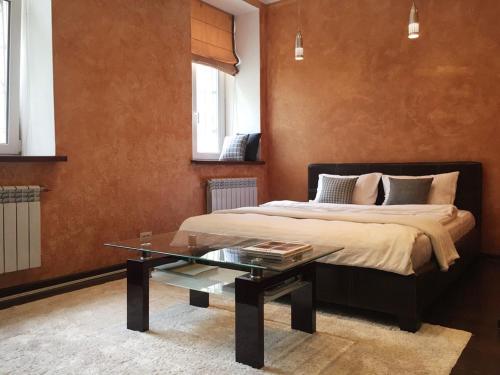 Krevet ili kreveti u jedinici u objektu Apartments on Andriyivskyy Descent ·SELF CHECK IN