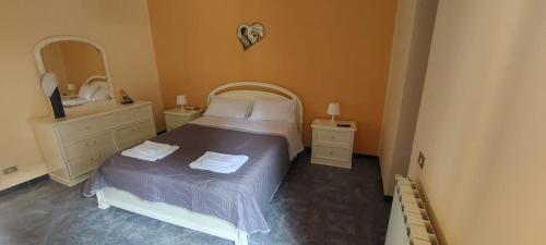 Letto o letti in una camera di La maison de Mary