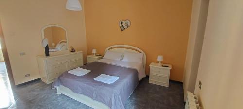 Letto o letti in una camera di La maison de Mary