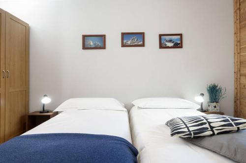 Postel nebo postele na pokoji v ubytování HelloChalet - Chez León