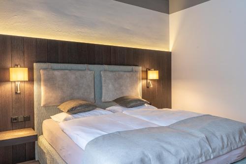 KAUZ - Design Chalets inkl Lungau Cardにあるベッド